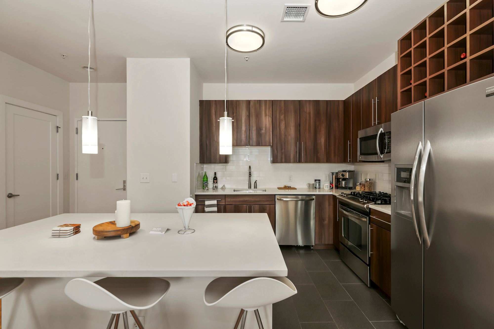 A modern kitchen with sleek, stainless steel appliances